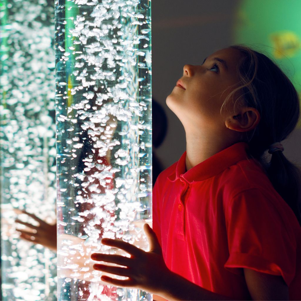 Girl looking at bubble timer